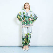 Load image into Gallery viewer, Floral tropical drawstring boho trousers in Black